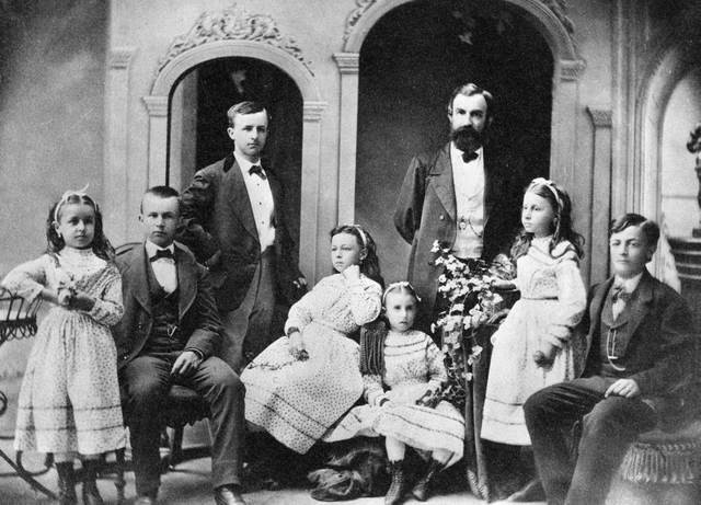 Simeon Hart poses with his children.