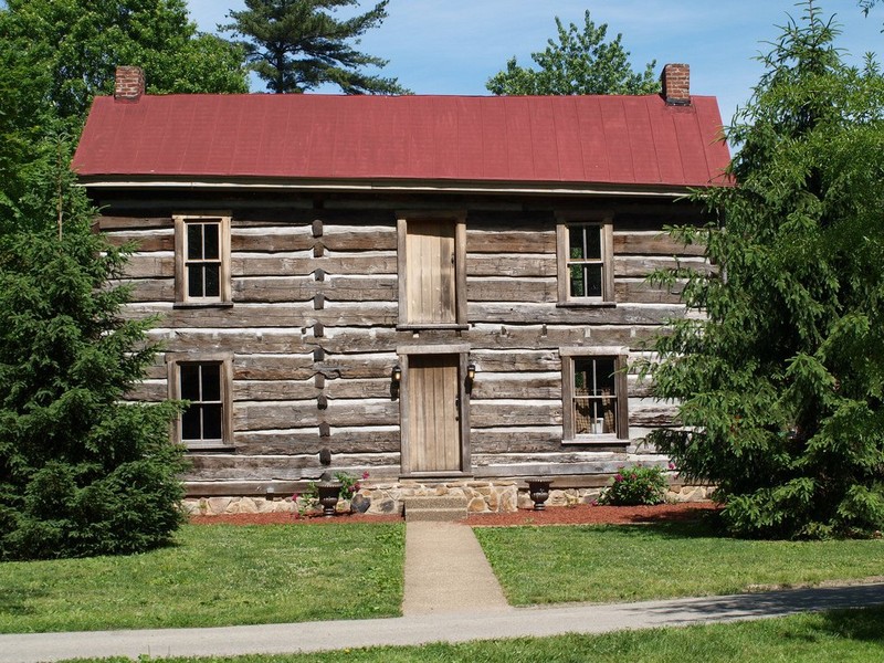 Picture of the Poage home where it sits in Ashland Central Park 