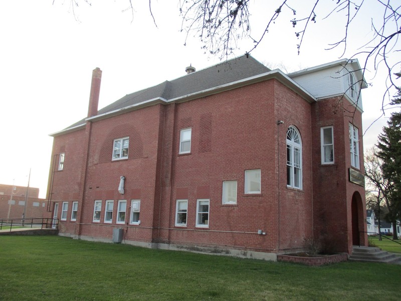 The south side of the building, showing evidence of changes to the exterior over the years, including the removal of the large Colonial Style fanlight windows.