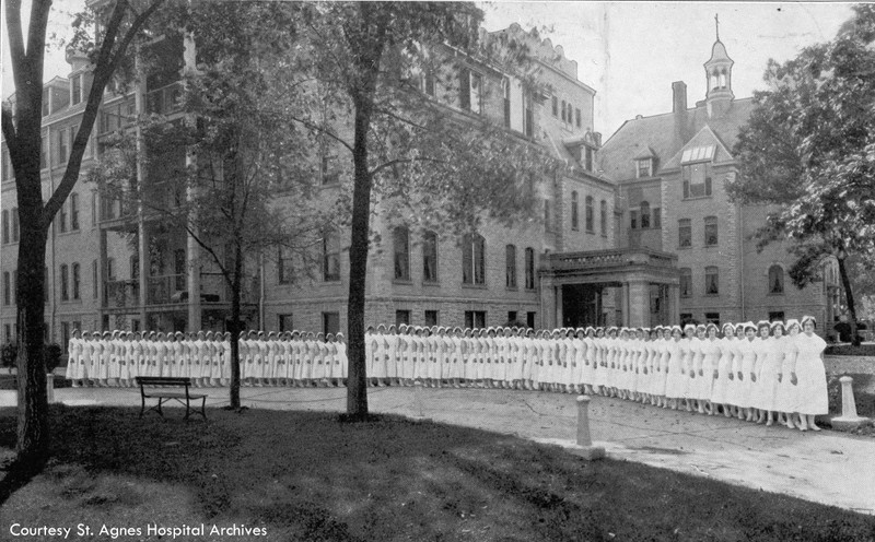 Nursing students stand outside St. Agnes Hospital, c. 1925.