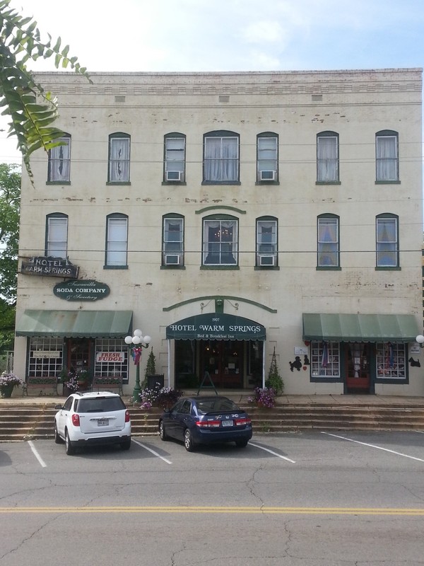 The Hotel Warm Springs (est. 1907) seen from Broad St. To the left is the ice cream and soda shop President Franklin Roosevelt would often visit. 