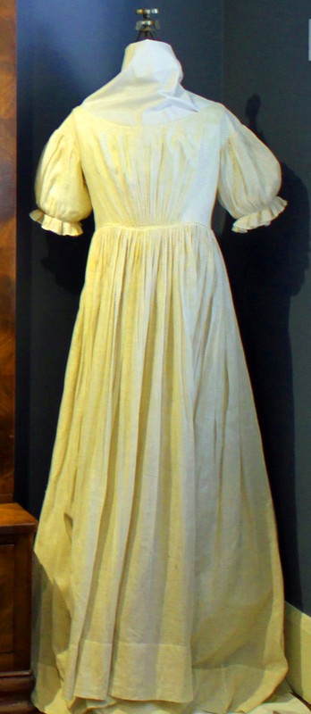 Cotton dress made by Lucy Pier Stevens while in Texas visiting her Aunt Lucy Merry Pier and Uncle James Bradford Pier. Lucy Stevens arrived in Texas on Christmas Day 1859 and because of the outbreak of the Civil War in 1861, she was trapped in Texas until she was able to escape on a Confederate blockade runner’s ship on April 17, 1865. Lucy arrived safely in Ohio on May 4, 1865 with this dress.