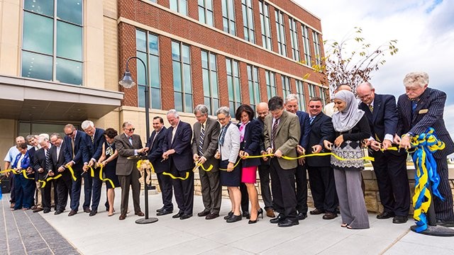 WVU President E. Gordon Gee with students and officials at the Ag Sciences ribbon cutting ceremony.