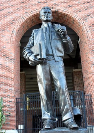 Nile Kinnick Statue in front of the main entrance into Kinnick Stadium. The statue is part of a tradition for the football team, as they touch the helmet walking into the stadium before a game.