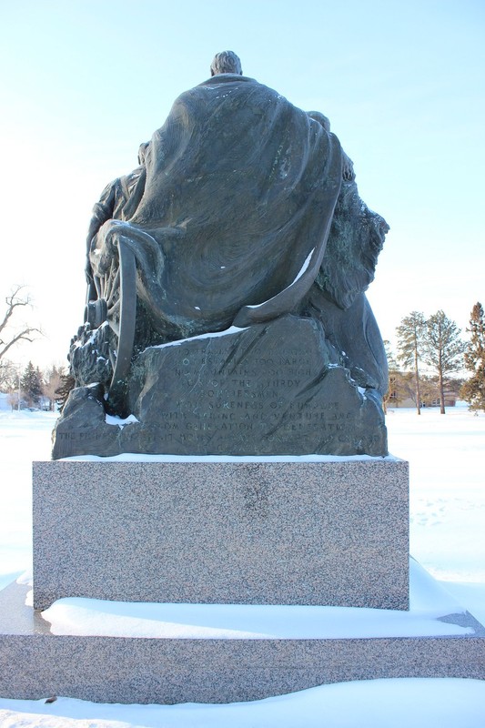 Reverse of statue with engraved inscription