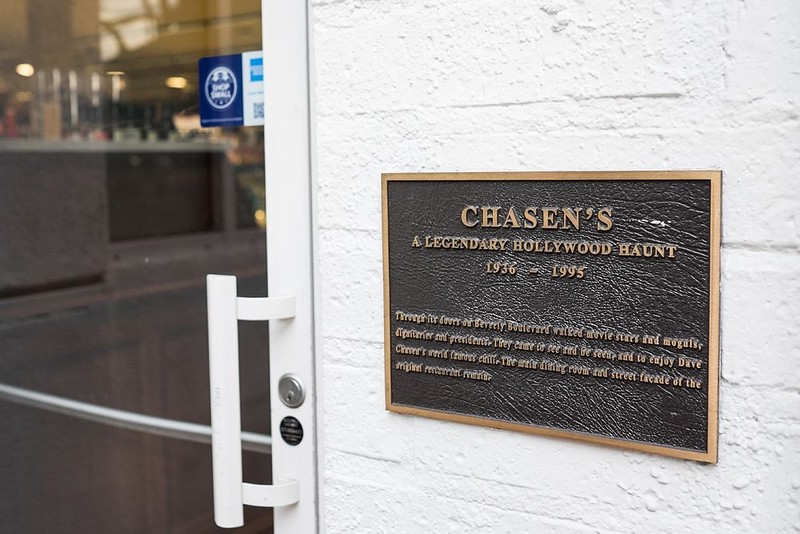 "Through its doors on Beverly Boulevard walked movie stars and moguls, dignitaries and presidents. They came to see and be seen, and to enjoy Dave Chasen's world famous chili. The main dining room and street facade of the original restaurant remain"