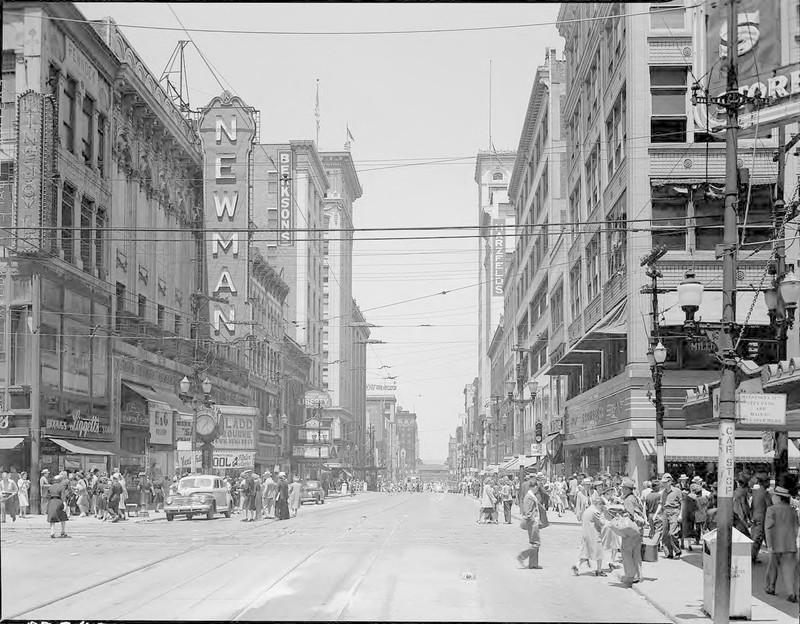 View of Main Street looking north from 12th Street in the 1940s. The Newman Theatre can be seen on the left, before it was renamed the Paramount. Image courtesy of the Missouri Valley Special Collections, Kansas City Public Library.