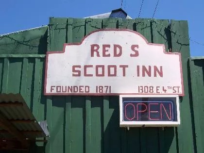 A sign from when the bar was known as Red's Scoot Inn, beginning in 1940