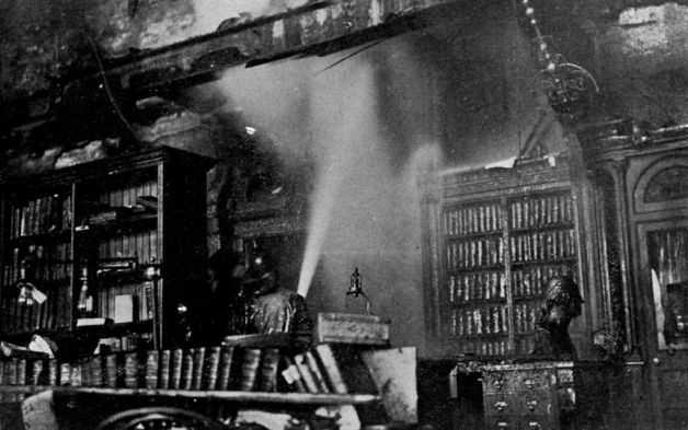 Firefighters control the blaze inside the capitol on March 29, 1911