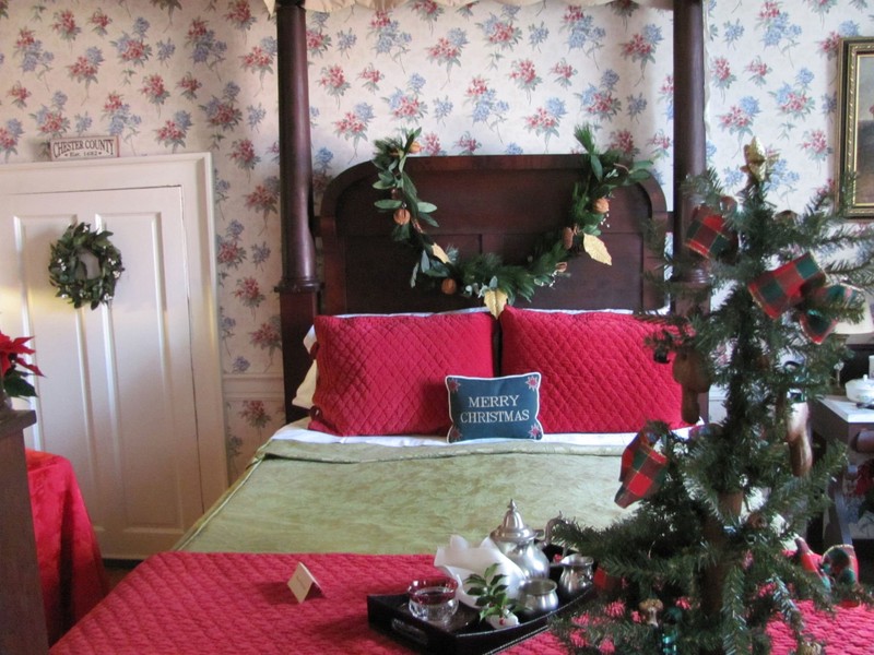 One of the bedrooms within the mansion decorated for the holidays.