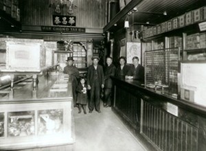 The photo shows the interior of Wah Chong Tai general store in 1905