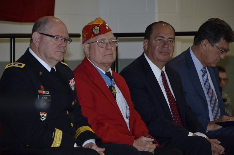 MG Burch, Woody Williams, Governor Tomblin, and Senator Manchin listen to the Adjutant General of the West Virginia National Guard speak at the dedication ceremony. Woody Williams is the only living Medal of Honor Recipient from Iwo Jima. 