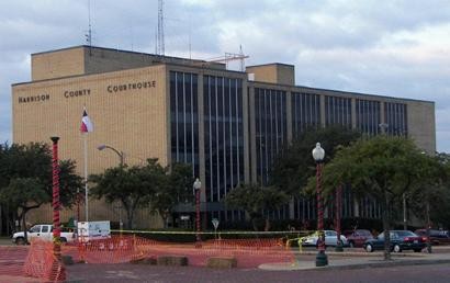The current county courthouse is of a much more modern style and sits across the square from the original building.