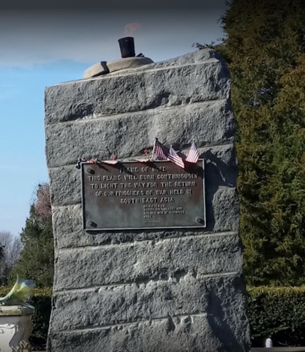 The monument includes a small plaque. 