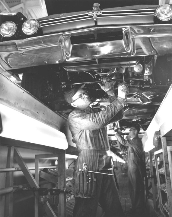 Workers on the line at Fremont Assembly. Unfortunately, the factory was renowned for disastrous quality control, employee absenteeism, and deplorable management practices. Toyota turned the workforce around when NUMMI opened in 1984.