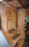 Upstairs hall with attic door and hidden cupboard (image from the Arlington Historical Society)