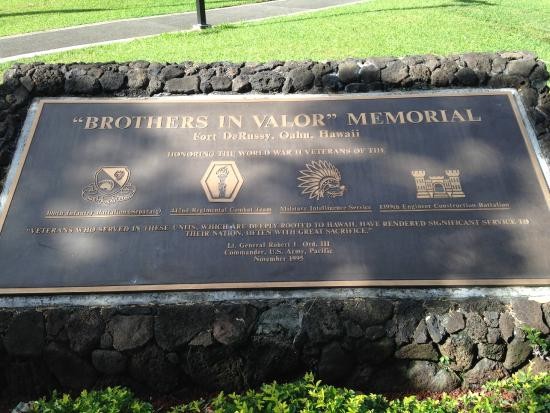 This piece of the memorial depicts the four unit symbols that represent the units that are honored. 