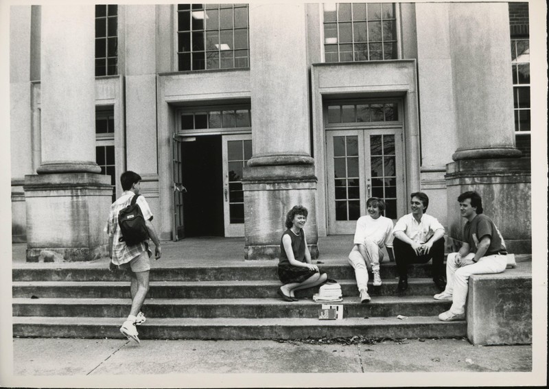 Students socializing on the front steps of Morton Hall