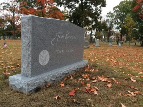 The second, larger grave marker. The original is just in front of it.