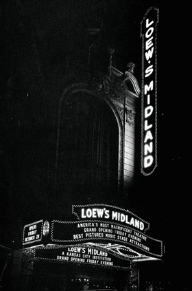 The Midland's illuminated sign on the night of its grand opening, October 28, 1927. Image obtained from Comfortably Cool, Cinema Treasures. 