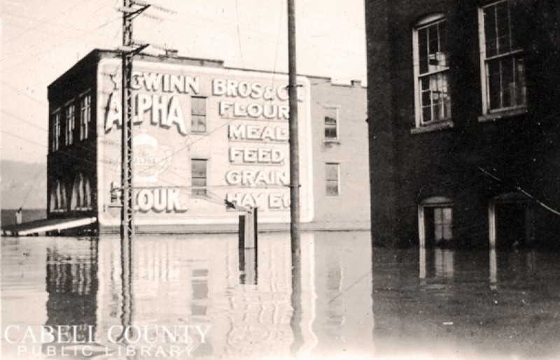 A building advertising Gwinn Bros. Mill during the 1937 flood