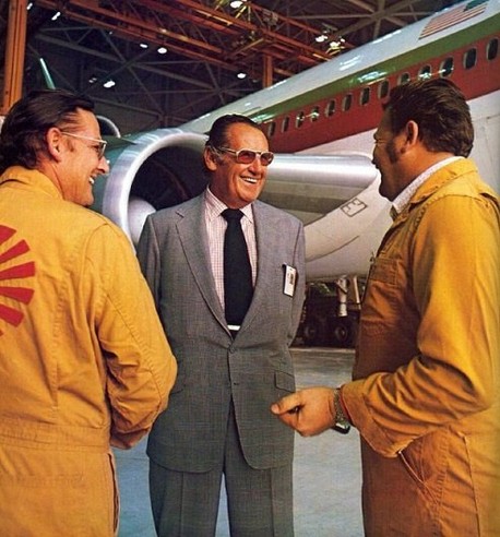 Robert F. Six, seen with Continental maintenance workers, served as president and chief executive office for over 40 years