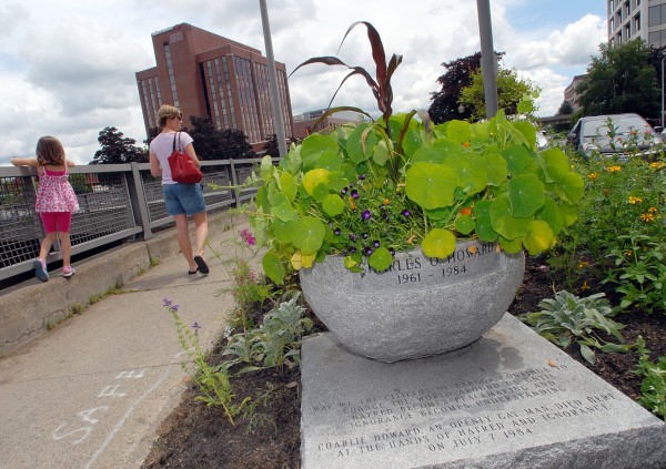 75 gathered in 2009 to re-dedicate the Charlie Howard Memorial after it was vandalized. Photo by John Clarke Russ of the Bangor Daily News