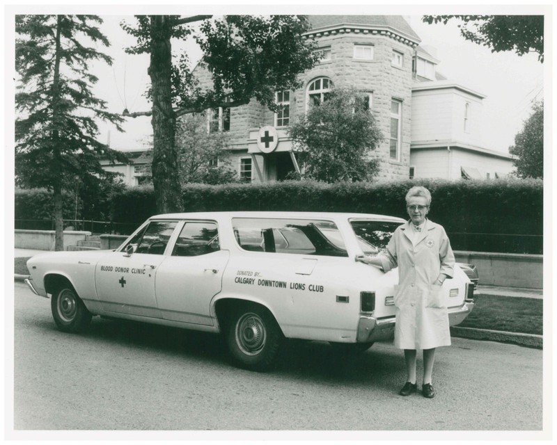 Mrs. T.L. O'Keefe in front of Blood donor clinic, Calgary