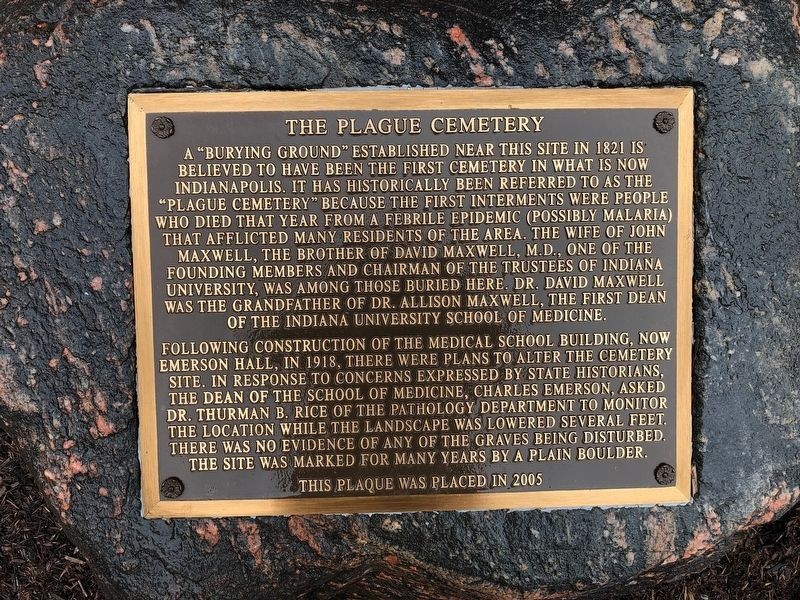 Close-up photograph of the Plague Cemetery historical marker.