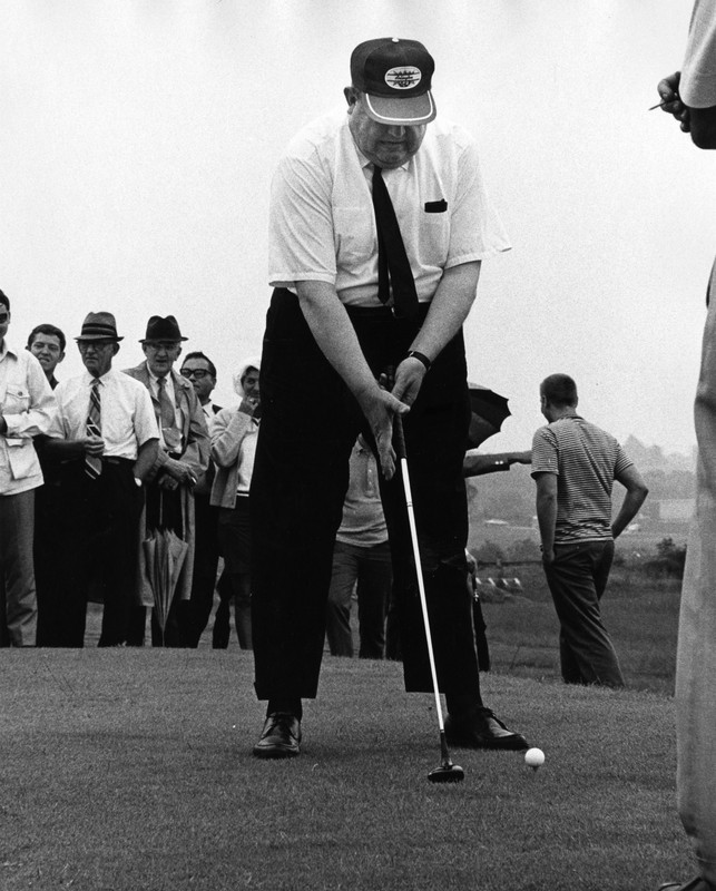 EKU President Robert Martin at the grand opening of the Arlington golf course, June 1970.  EKU Photograph Collection.