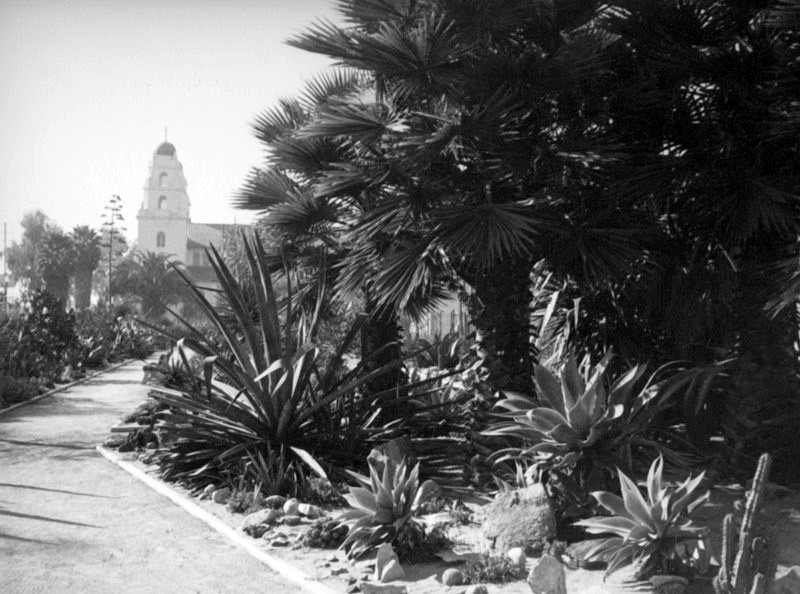 Photograph from the 1930s of Beverly Gardens Park with Church of The Good Shepherd in the background 