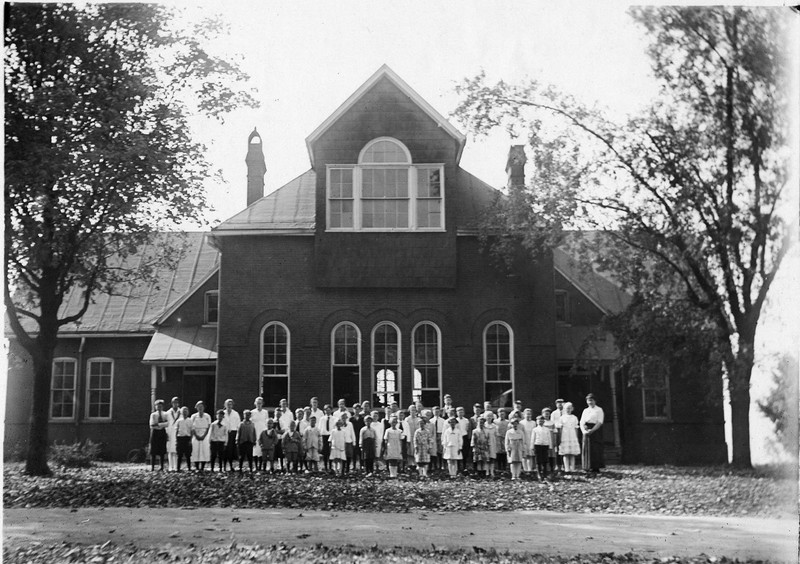 Central University Preparatory School Building with students in the front yard, 1920s. EKU Photo Collection.