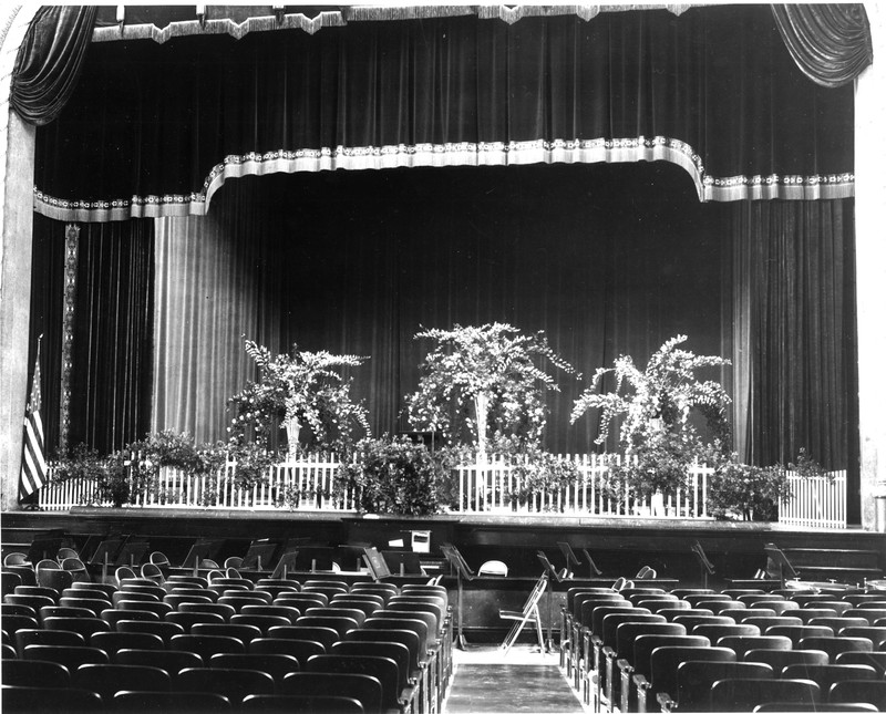 Stage decorated for commencement, ca. 1938. EKU Photograph Collection.