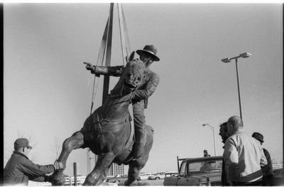 Putting the statue in place, 1977.  EKU Photo Collection.