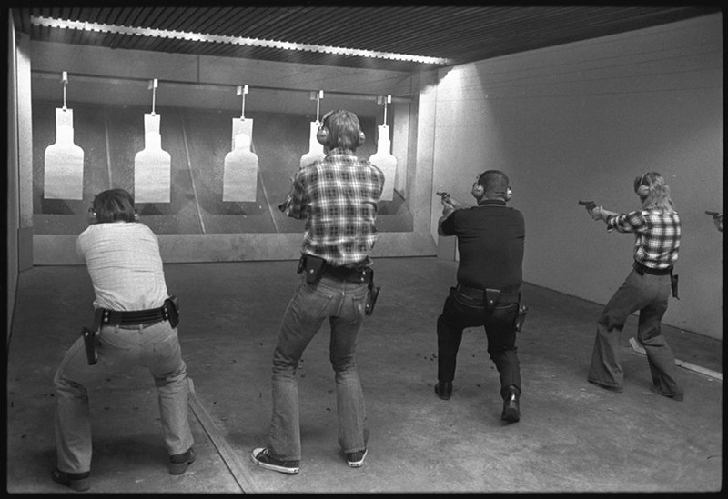 Students practicing on the firing range in the Robert R. Martin Law Enforcement Center, 1976. EKU Negative Collection