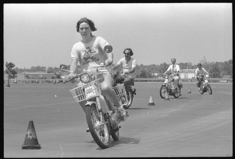 A moped clinic organized by the Traffic Safety Institute on the Leslie Leach Driving Range, 1978. EKU Negative Collection