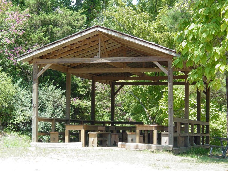 Bus barn converted into an open-air pavilion next to 1914 Schoolhouse