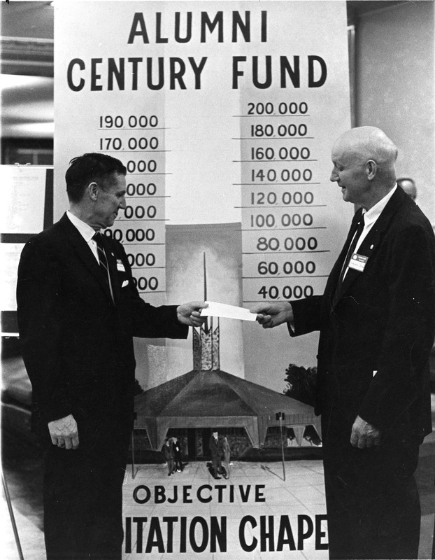 Clarence Gifford presents James W. Thurman a pledge on behalf of the Class of 1909 for the construction of the Meditation Chapel, 1968.  EKU Photo Collection.