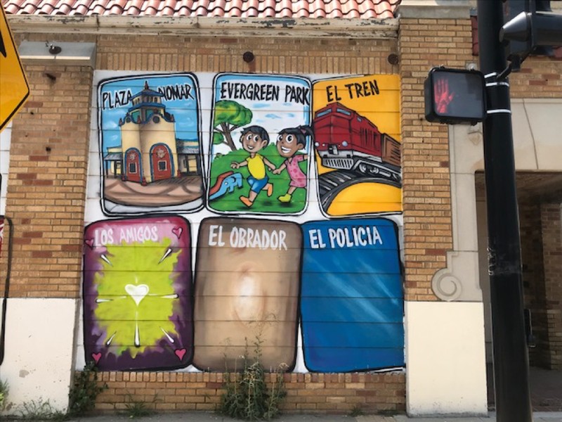 Across the street from the NoMar International Market there is a mural spearheaded by Armando Minjarez and other volunteers. the mural depicts issues the community is concerned with especially police abuse and topics such as Santa Fe railroads. 