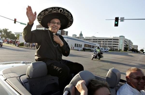 Father Gaitan in parade