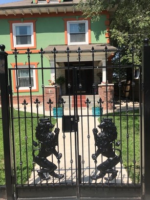 Beautiful Gates with colorful house. 