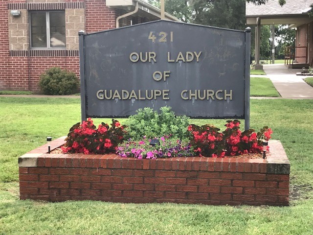 Plaque located in the front of the church 