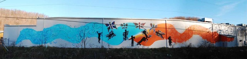 The Metamorphosis mural along the Deckers Creek Rail Trail