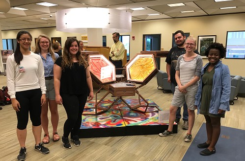 2018 CESTA members pose with their completed installation, "Cytochrome C" in Evansdale Library