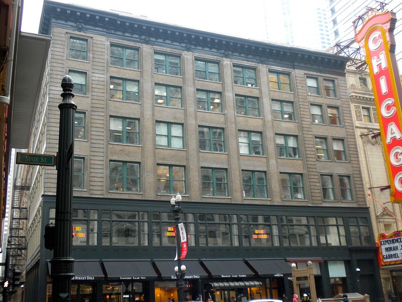 Page Brothers Building as viewed from State Street. The famous Chicago Theater, also on State, is located to its right (south) along State Street. 