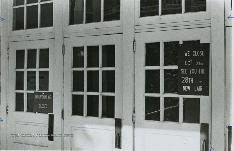 Sign on the Old Mountainlair announcing its closing in 1967: "We close Oct 22nd. See you the 28th at the New Lair." Photo courtesy of West Virginia and Regional History Center.