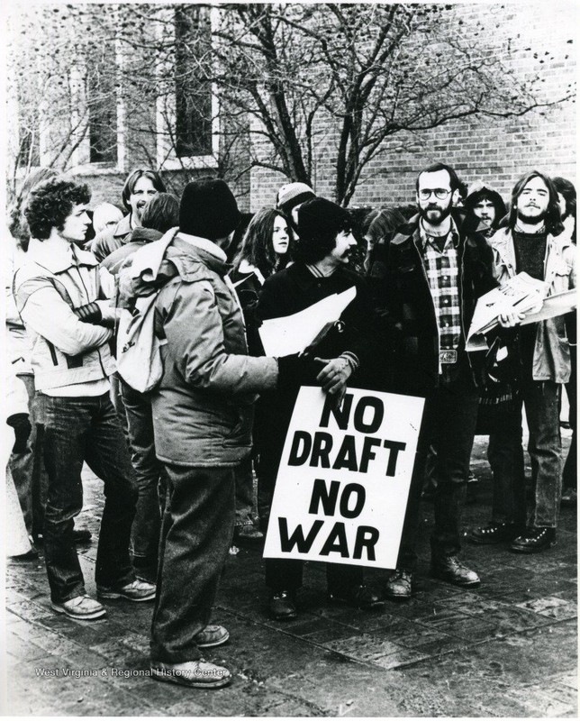 The front of the Mountainlair has long been a site for civic and political activism, like these students protesting the draft in 1980. West Virginia and Regional History Center, WVU Libraries.