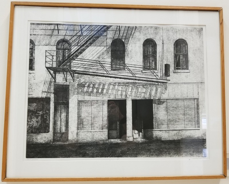 "Gray Sunday", by Michael Morin. Lithograph. On display on the second floor of the Mountainlair down the hall to the left after coming up the main stairs. In the permanent Mountainlair Collection.