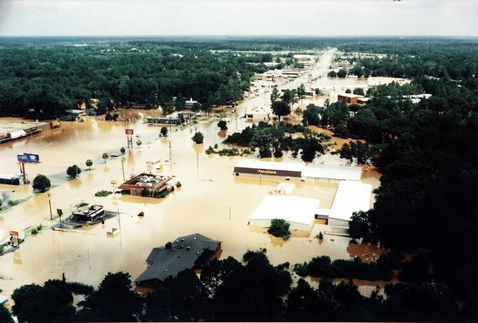 An aerial view shows North Slappey Boulevard swamped with flood water in July 1994.