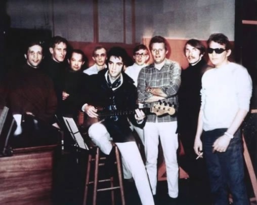 Elvis Presley with the house band for the American Sound Studio.